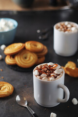 A mug with hot chocolate with marshmallow