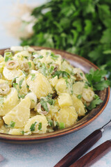 A bowl with Greek potato salads	