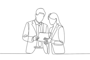 Business professionals collaborating on a tablet