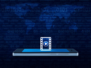 Play button with movie icon on modern smart mobile phone screen over world map and computer binary code blue background, Business movie online concept, Elements of this image furnished by NASA
