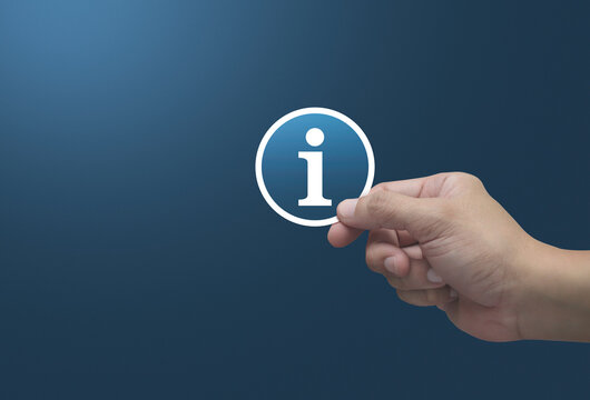 Hand holding information sign flat icon in fingers over light blue background, Business customer service and support concept