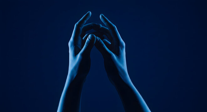 Focused Hands Holding Wedding Ring Against Blue Sky