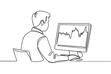 Man working on computer with stock market graph