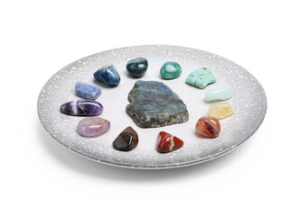 Many different healing stones isolated on white