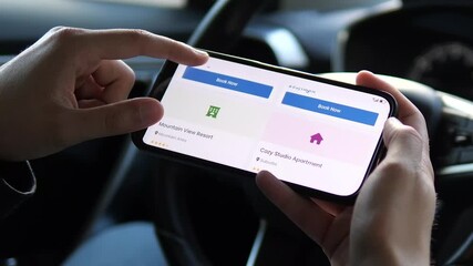 A travelers hands swipe through accommodation options on a booking platform, comparing choices for the best stay. Ideal for tourism content, app reviews, or wanderlust-inspired projects.