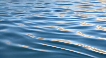 Rippled Blue Water Surface with Sunlight Reflections