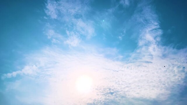 The sun's shining and clouds on blue sky background compound of a monastery at Bangkok, Thailand. 11 MAY 2025 A.M./ Speed up VDO