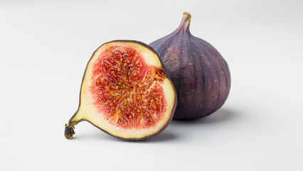 Fresh figs on a light background. Concept of healthy eating, natural products and vegetarian food. Horizontal.