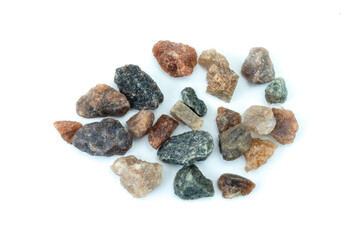 pile of stones, Himalayan black salt or Kala namak isolated on white background top view flat lay stack 