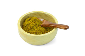 Curry powder in wooden cup with  spoon isolated on white background close up stack clipping path