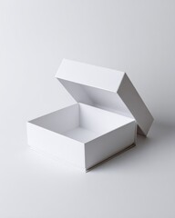 Open white gift box on a plain surface