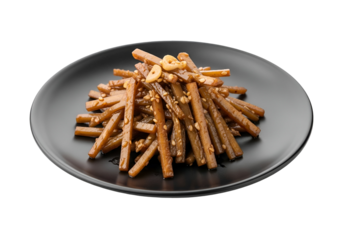 A dark plate holds a flavorful mound of stir-fried vegetable strips, topped with sesame seeds and garlic.