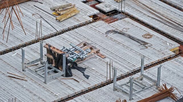 Office Building Construction Site with Rebar Reinforcement Rods Precast Concrete Ceiling Slabs