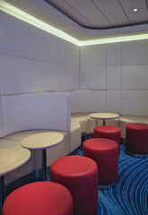 Single and mingle lounge bar snack bistro for solo travellers onboard modern cruiseship cruise ship liner in colorful futuristic interior design