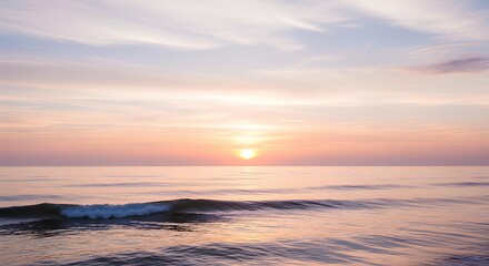 Obraz premium Peaceful ocean sunset with golden light on calm water, pastel pink and purple clouds over tranquil sea horizon, serene coastal view for nature, travel and landscape.