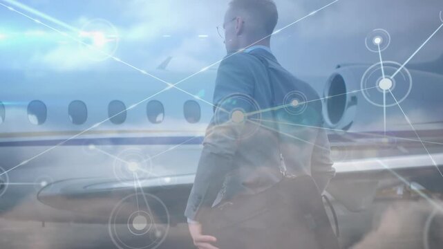 Animation of network of connections over businessmen at the airport