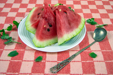 pieces of fresh ripe watermelon on a plate