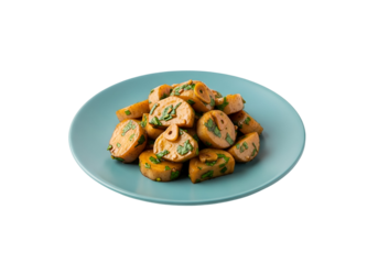 A light teal plate holds a flavorful dish of seasoned, sliced root vegetables, garnished with fresh herbs and garlic.