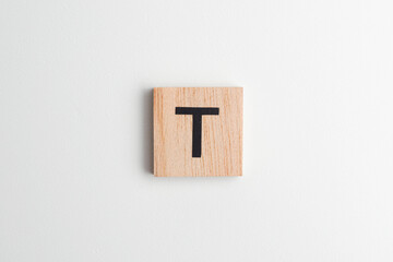 Wooden alphabet block with the letter 