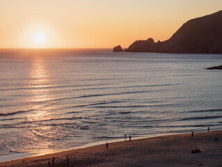 Finisterre Sunset in Galicia, Spain. Mar de Fora beach and Nave cape in Costa da Morte. This is the final step in the Camino de Santiago.