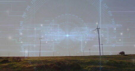 Displaying large wind turbine rotating over grassy plain, with digital HUD overlay, copy space