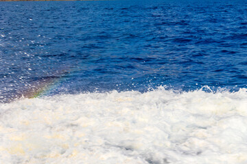 Rainbow in sea spray near Calanche di Piana cliffs France, Corsica, Calanche di Piana, 19 June 2025
