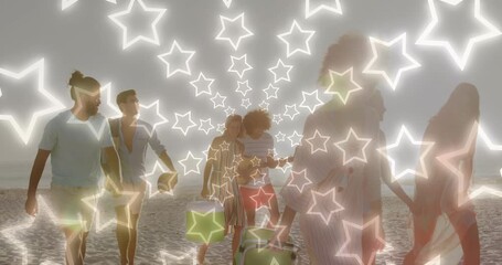 Animation of neon stars changing colours over happy diverse friends walking on beach - Powered by Adobe