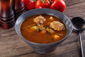 Tomato Soup with meatballs and vegetables