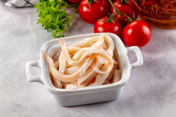 Canned marinated squid rings heap