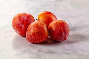 Ripe sweet juicy fresh purple plums