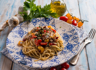 spaghetti with fresch anchovy  tomato and capers
