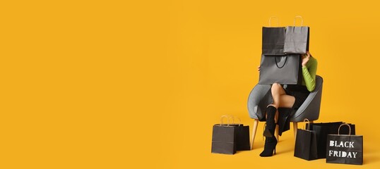 Banner with woman with many shopping bags sitting in armchair on yellow background. Black Friday...