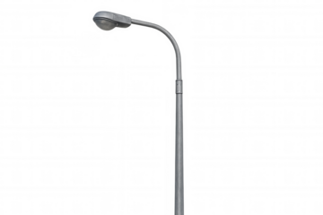 Sleek streetlight standing tall against transparent backdrop, highlighting contemporary urban design with minimalist aesthetic