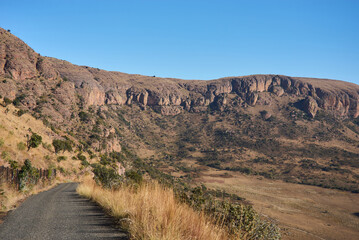Marakele National Park safari game drive in Limpopo province, South Africa, with amazing scenic views of mountains, savanna, and wildlife habitat. The landscape combines rugged peaks, open grasslands,