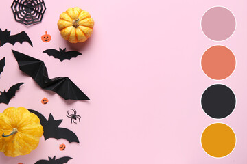 Paper bats with spider, web and fresh pumpkins for Halloween party on pink background