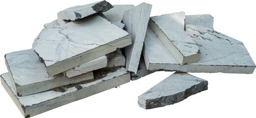 Pile of rough cut stone slabs in various sizes and shapes.