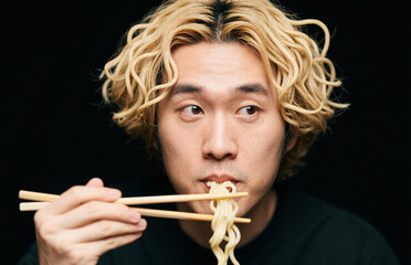 Natural haired noodle maniac guy