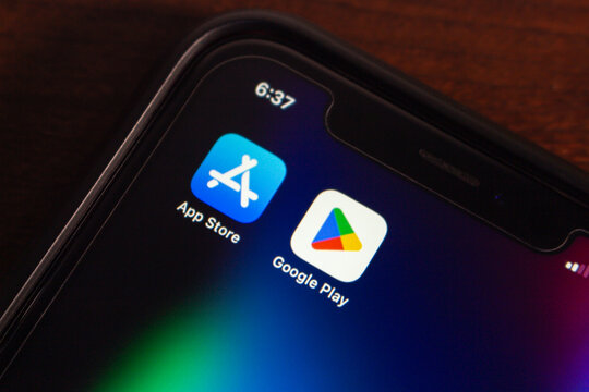 Mexico City, MEXICO - Sep 3 2025 : Smartphone screen showing side-by-side icons for Google Play and App Store, representing Android and iOS app platforms.