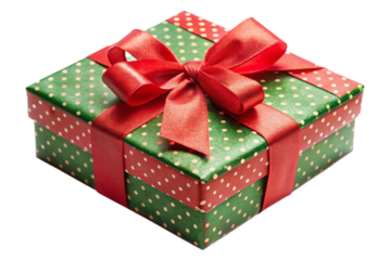 Festive christmas gift box wrapped in red ribbon and green patterned paper isolated transparent background