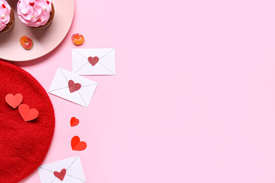 Red beret with cupcakes and decor on pink background. Valentine's Day celebration - Powered by Adobe