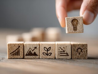 Leadership Success Strategy, Unlocking Business Goals with Sustainable Growth and Innovative Solutions with signs on Wooden Cube.