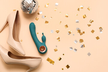 Composition with stylish high heeled shoes, vibrator and confetti on color background