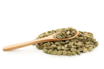 Wooden spoon with cardamom spice on white background
