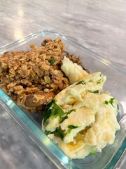 Savory Oatmeal with Egg and Spinach in Meal Prep Container