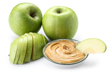 Fresh apples and bowl of sweet peanut butter on white background