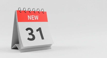 A close up of a desk calendar showing the date thirty one with the word new on the top of the page