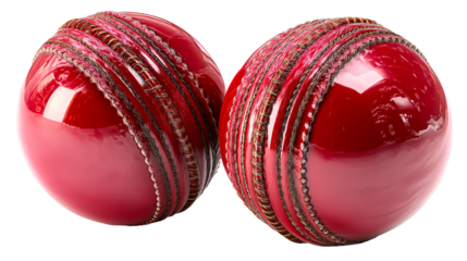 Two glossy red cricket balls with prominent stitching on a plain white surface, cut out transparent