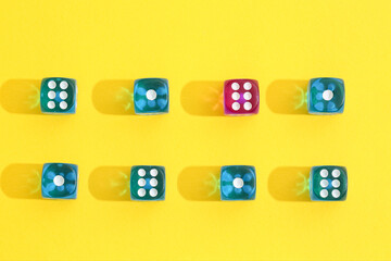 Different game dices on yellow background