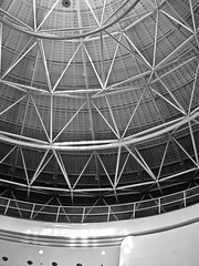 Abstract geometric structure with intersecting lines forming a star-like pattern.