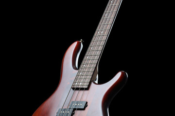 Obraz premium Modern electric guitar on black background